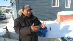 Fred Sangris says he’s been cutting his own firewood for 40 years without a permit to fuel the wood stove in his home in N’Dilo, N.W.T. In January of this year, he was shocked when he was issued a $230 fine for illegally harvesting wood near Dettah. (CBC)