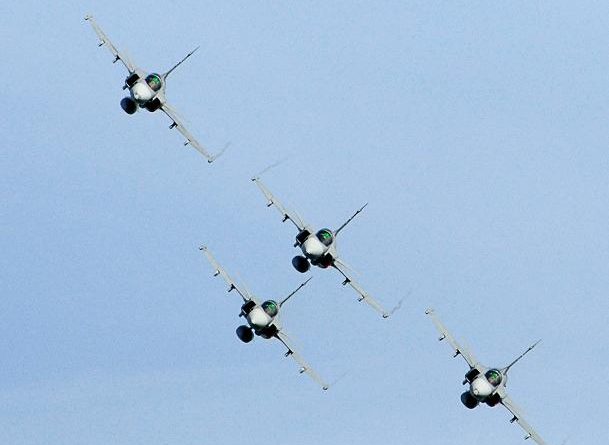 Pilots flying four JAS 39 Gripen jet fighters perform during the Day of the Airforce in Linkoping, Sweden on June 13, 2010. (AFP)