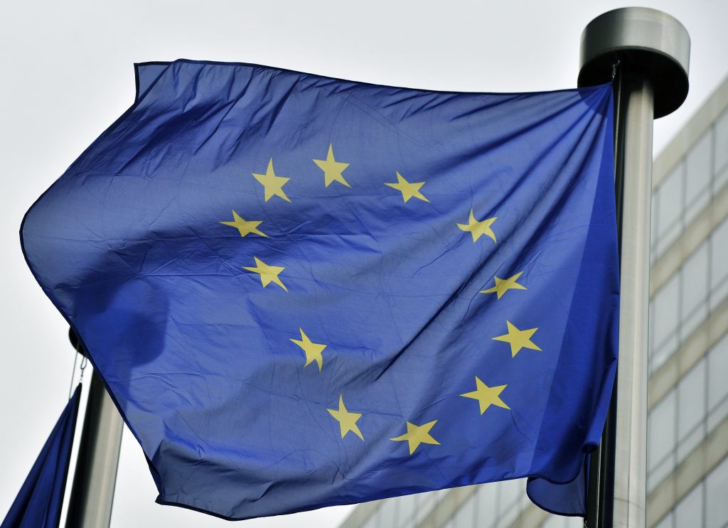 A European flag flies at the entrance of the EU Commission in Brussels on May 21,2014. (Georges Gobet/AFP/Getty Images)