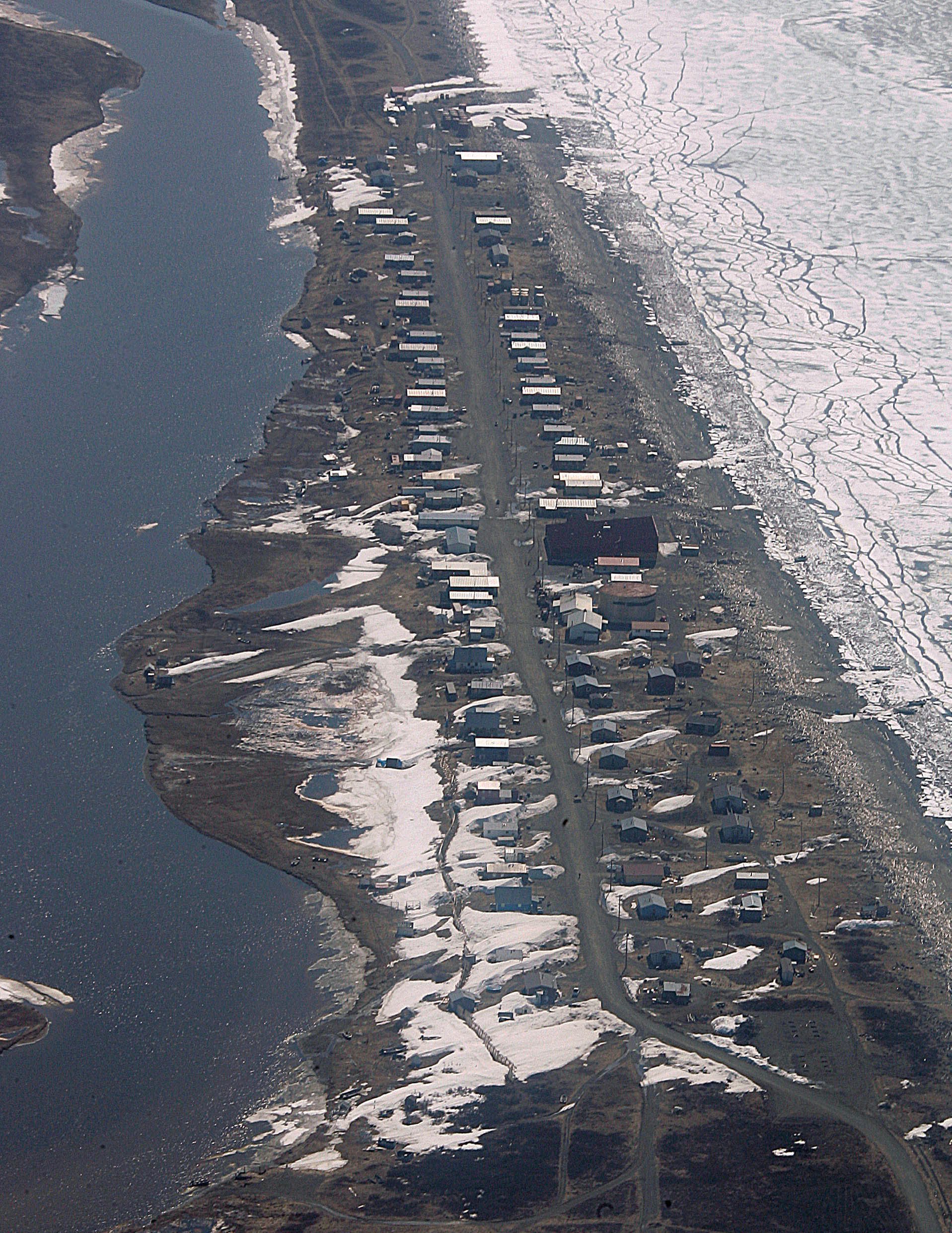 Village of Shaktoolik, Alaska, shown in May 28, 2006. Climate change is causing erosion and other environmental challenges for Alaska communities like this one. (/Al Grillo / AP Photo / File)