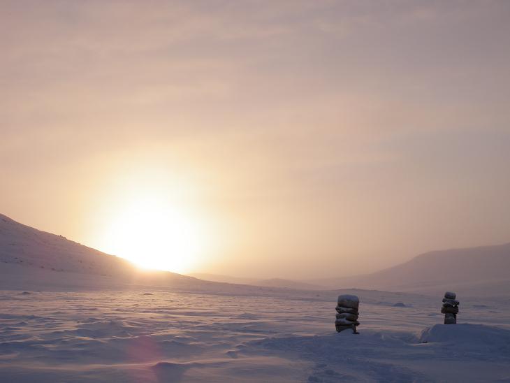 Small inukshuks on the outskirts of Qikiqtarjuaq, Nunavut. Climate change is transforming everything from animal behaviour to traditional hunting routes. (Eilís Quinn/Eye on the Arctic)