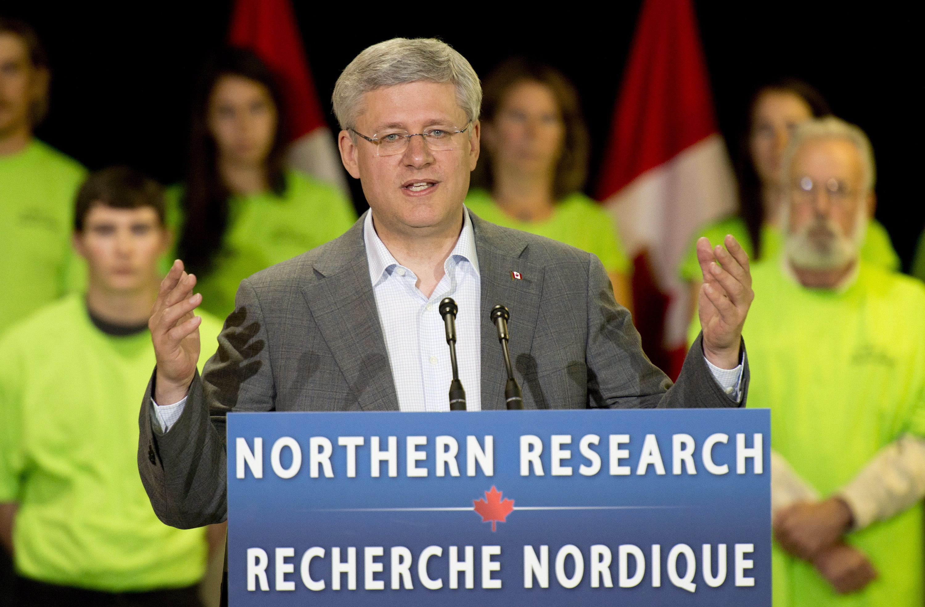 Canadian Prime Minister Stephen Harper responds to questions after making an announcement at the Yukon college in Whitehorse, Thursday August 21, 2014. (Adrian Wyld / The Canadian Press)
