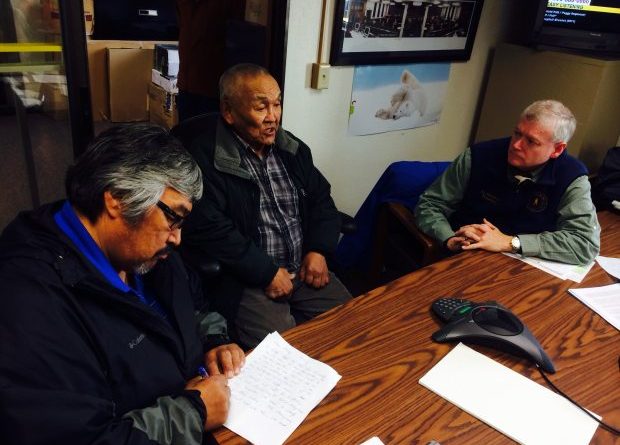 Musher and sobriety activist Mike Williams, left, elder John Phillip and Lt. Gov. Mead Treadwell in Bethel at a town hall meeting on the marijuana legalization initiative on Sept. 29, 2014. (Lisa Demer / Alaska Dispatch News)