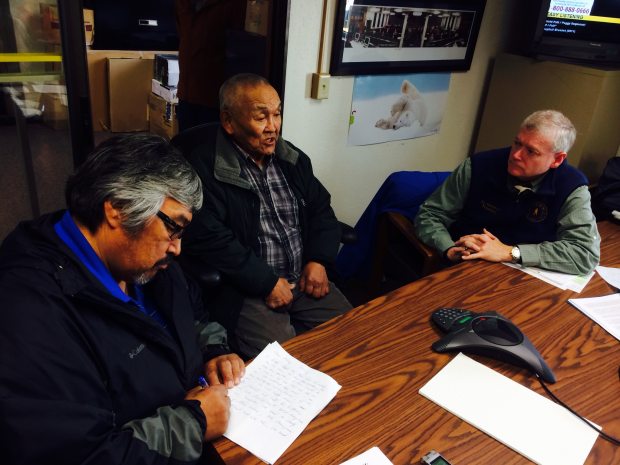 Musher and sobriety activist Mike Williams, left, elder John Phillip and Lt. Gov. Mead Treadwell in Bethel at a town hall meeting on the marijuana legalization initiative on Sept. 29, 2014. (Lisa Demer / Alaska Dispatch News)