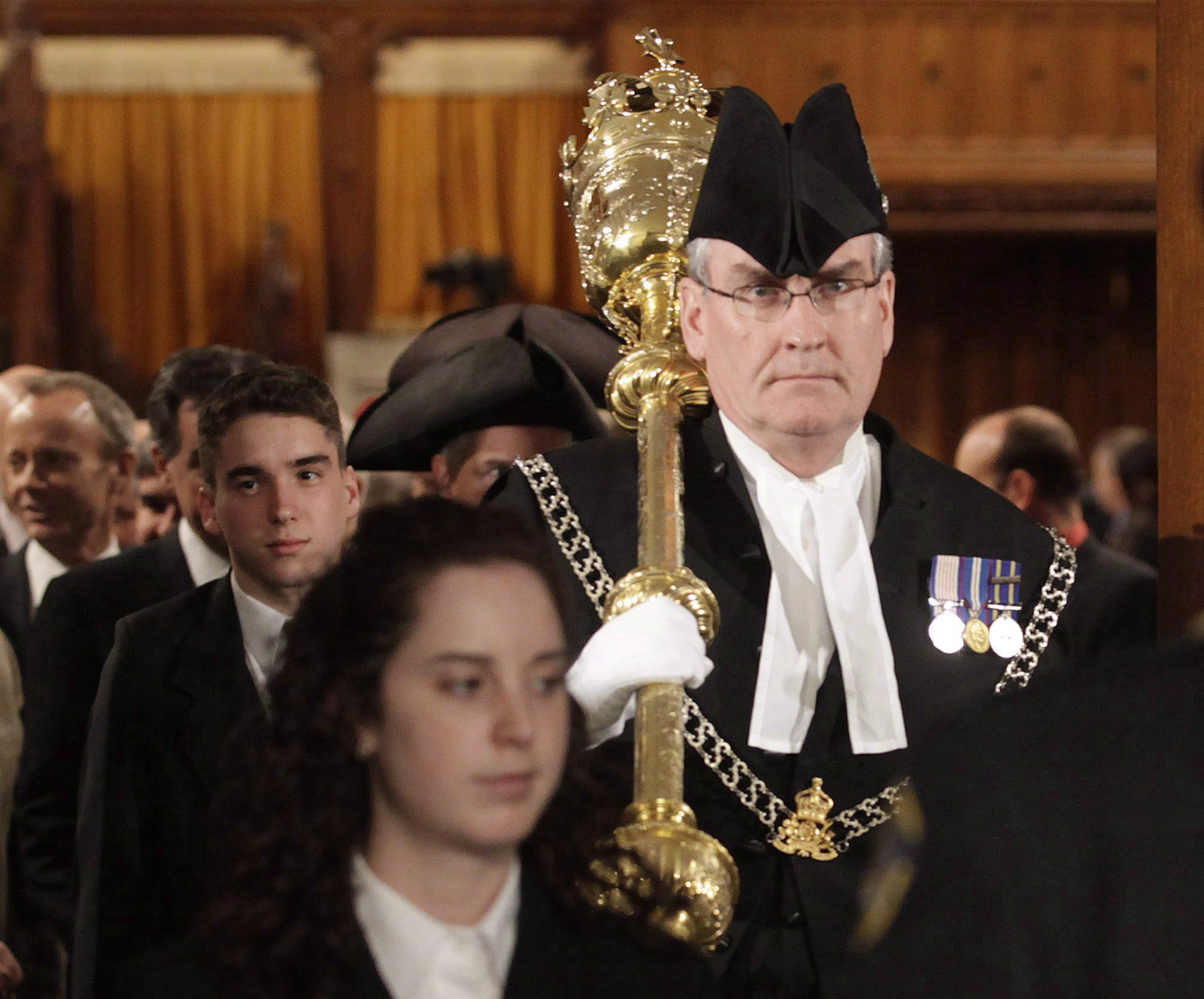 Sergeant-at-arms Kevin Vickers of the House of Commons leads MPs out of the House of Commons on Parliament Hill in Ottawa on Wednesday, March 3, 2010. Two sources told The Canadian Press that Vickers shot an assailant on Parliament Hill on Wednesday. (Pawel Dwulit / The Canadian Press)