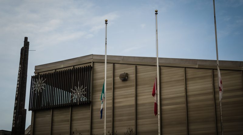 Flags in front of the main Yukon Government Building and Yukon Legislative Assembly in Whitehorse flew at half-mast on Wednesday after the Ottawa attack. (Yukon Government)