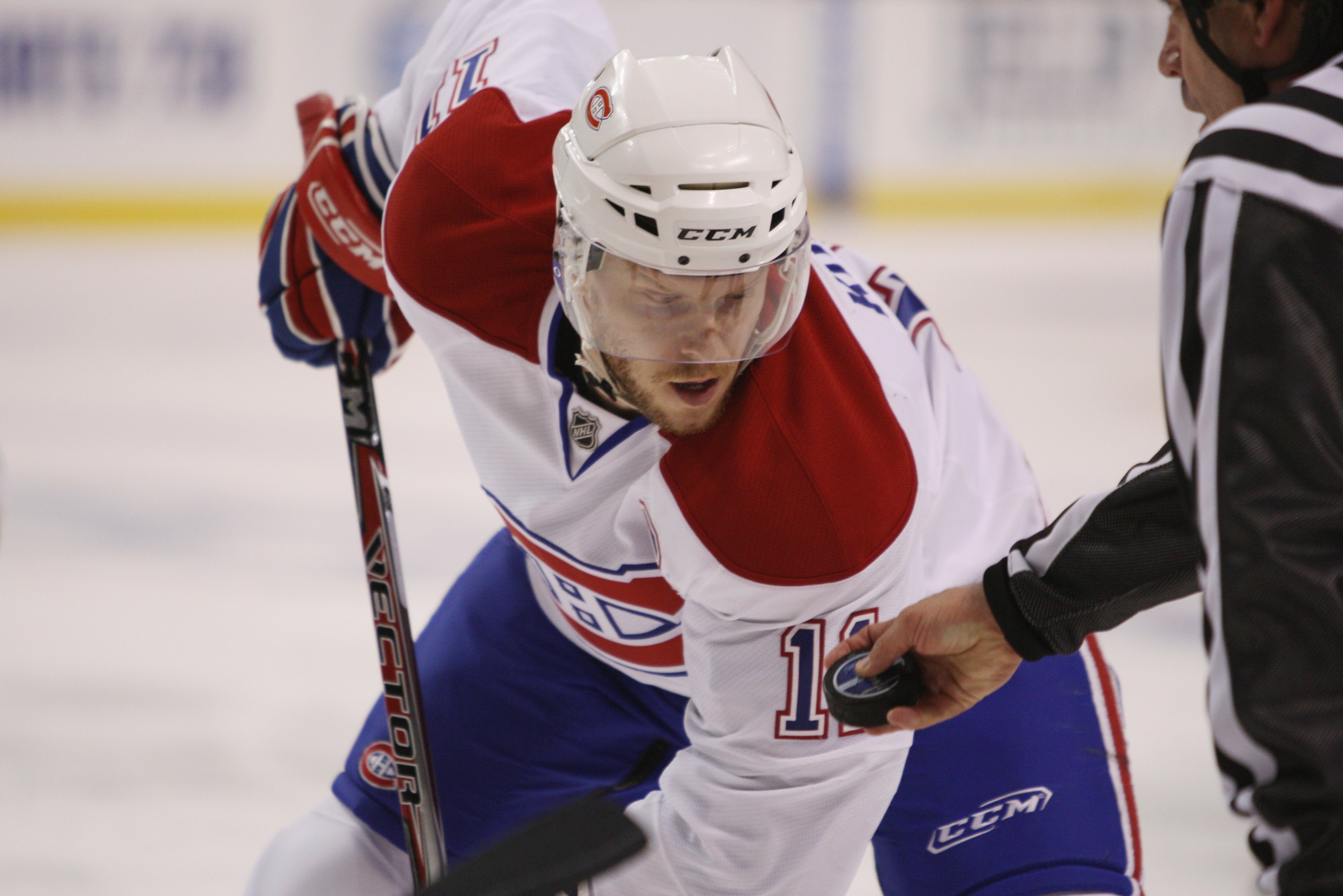 Saku Koivu in his Montreal Canadiens uniform during a face-off against the Boston Bruins during game six of the 2008 NHL Stanley Cup Playoffs Eastern Conference Quarterfinals series in 2008. (Getty Images)