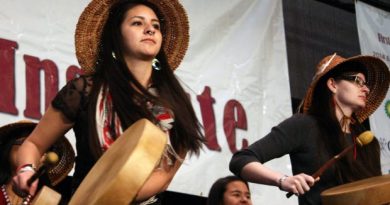 Jill Kaasteen Meserve, 23, of Juneau, performs with the Woosh.ji.een Dance and Drum Group at the First Alaskans Institute Elders and Youth Conference on Wednesday. Meserve said she supported a bill passed this year recognizing 20 Alaska Native languages as official state languages. (Lisa Demer / Alaska Dispatch News)