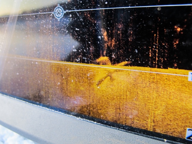Bjørn Ballo’s sonar screen shows the P-40 plane wreck directly underneath his boat. (Jimmy Thomson/Barents Observer)