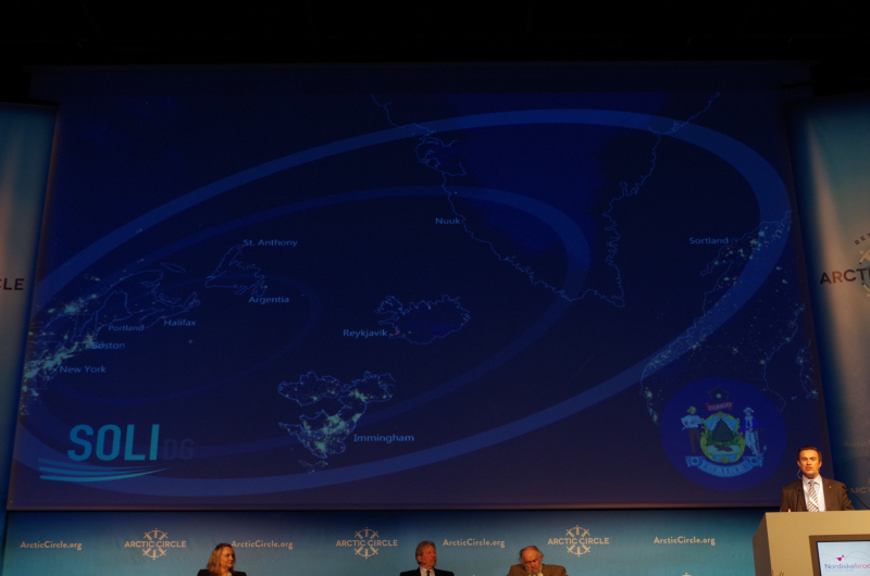 A cost geography map of the North Atlantic for the Maine Port Authority behind Patrick Arnold, Director of Operations and Business Development for the Maine Port Authority. (Mia Bennett)