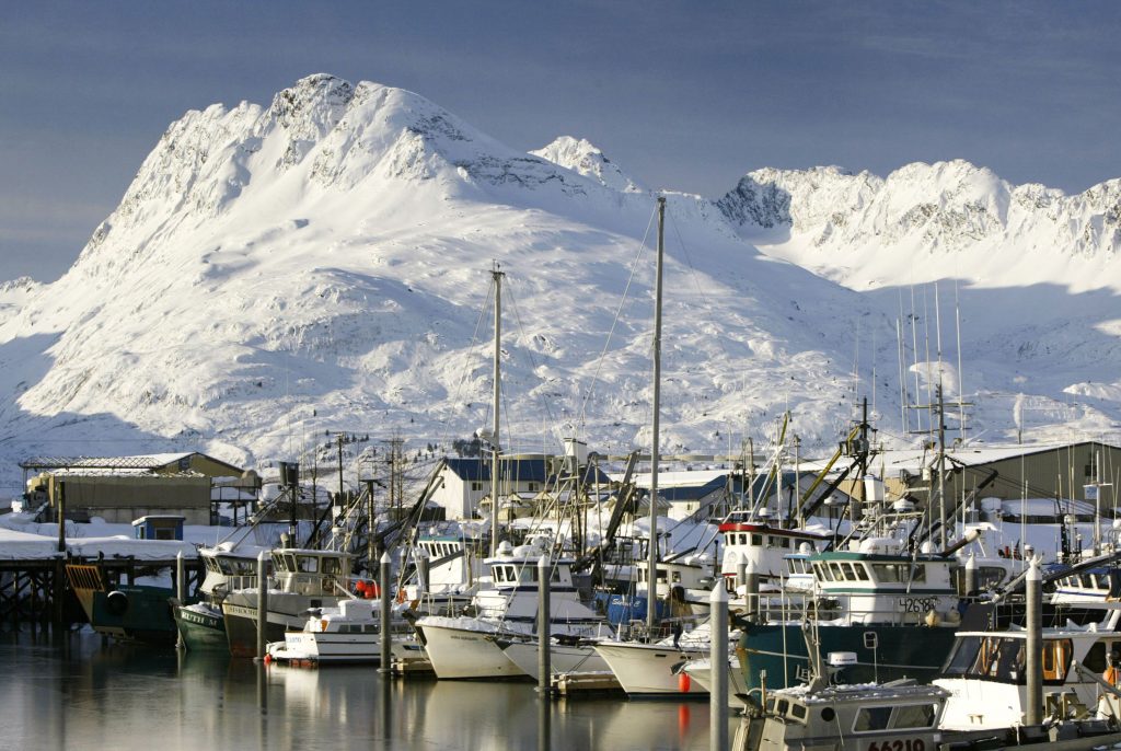 Fishing boats are moored in icy water at the small boat harbor on April 1, 2004 in Valdez, Alaska. (David McNew/Getty Images)