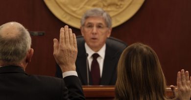 Lt. Gov. Byron Mallott issues the oath of office to members of the Alaska House of Representatives on Tuesday, Jan. 20, 2015 during the opening of the 29th Alaska Legislature. (James Brooks/Juneau Empire/AP Photo)