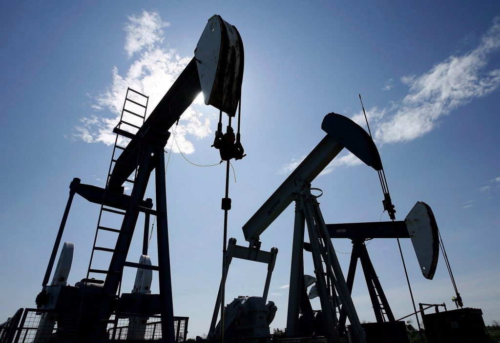 Pumpjacks at work pumping crude oil near Halkirk, Alta., June 20, 2007. (Larry MacDougal/The Canadian Press)