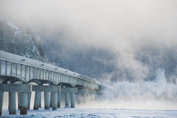 Fog drifts over open water on the Knik River near the Glenn Highway bridge on Wednesday, Jan. 28, 2015. (Marc Lester / ADN)