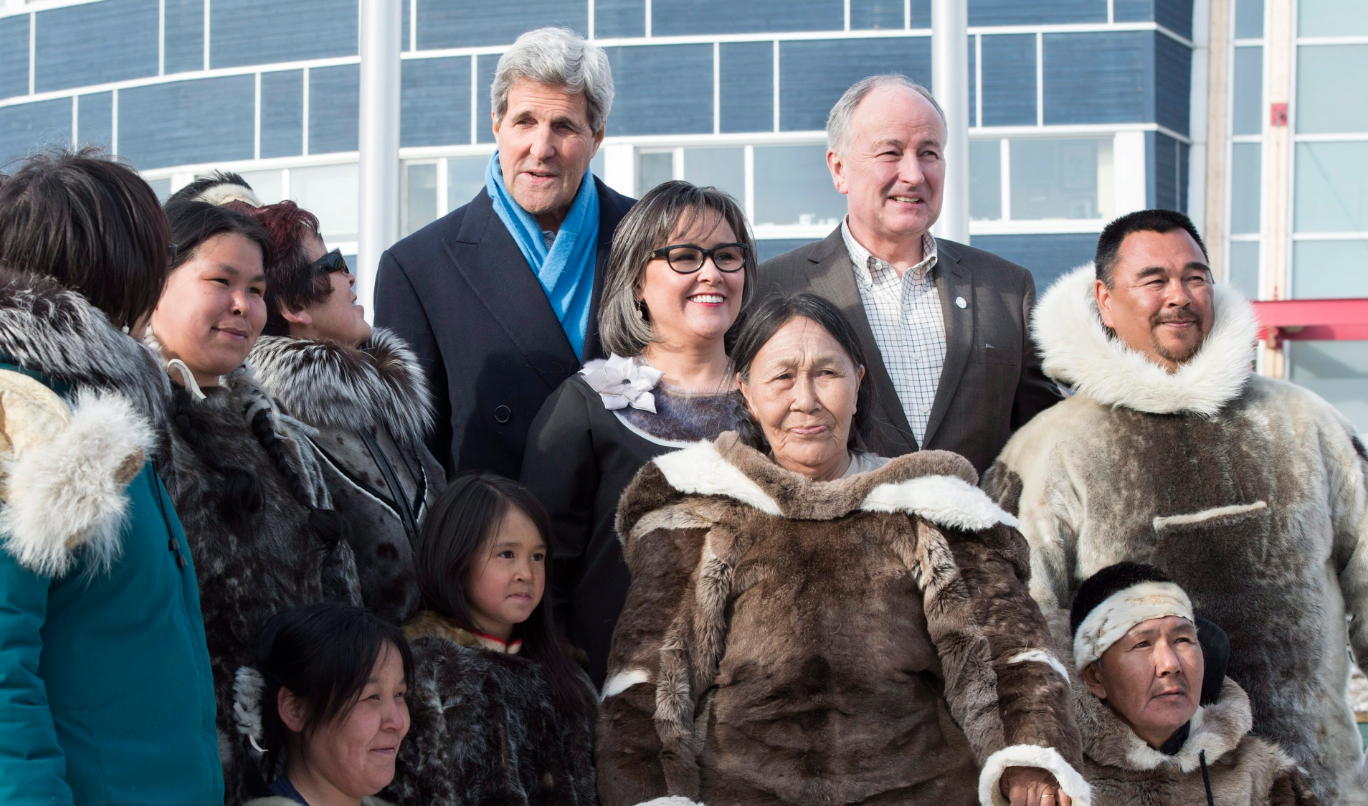 United States Secretary of State John Kerry, Canadian Minister for the Arctic Council Leona Aglukkaq, and Canadian Foreign Affairs Minister Rob Nicholson pose with Inuit wearing traditional dress at the Arctic Council Ministerial meeting Friday, April 24, 2015 in Iqaluit, Nunavut. Ministers from the eight Arctic nations and the leaders of northern indigenous groups form the Council. (Paul Chiasson/The Canadian Press)