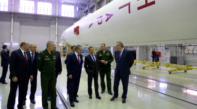 In this Wednesday, Feb. 19, 2014 file photo, Russian Prime Minister Dmitry Medvedev, third right, visits an assembly shop, with the Angara booster rocket at right, at the Plesetsk Cosmodrome in Plesetsk, northwestern Russia. The recent Angara A5 rocket launch failed and crashed near a near the village of Zabolotye in Arkhangelsk Oblast. (Alexander Astafyev/ Government Press Service/RIA-Novost/AP)
