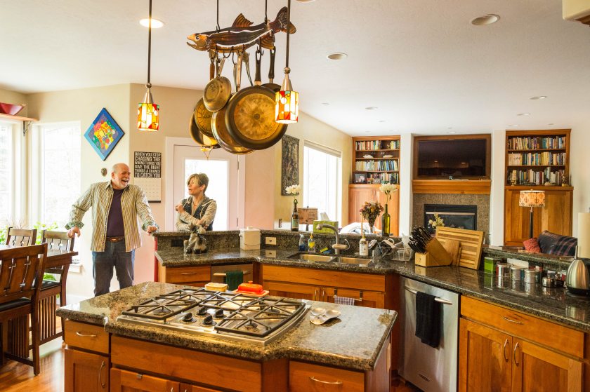 Couple Ron Clarke and Kristine Kennedy in their west Anchorage home. (Loren Holmes / Alaska Dispatch News)