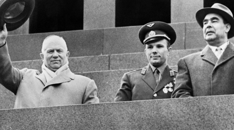 Soviet Cosmonaut Yuri Gagarin (centre), Soviet leader Nikita Khrushchev (left) and Leonid Brezhnev (right) salute the crowd on May 1, 1961 during a gathering on Red Square to celebrate Gagarin's flight aboard Vostok I. Yuri Gagarin became the first human to travel in space aboard Vostok I and the first to orbit the Earth. For decades, the U.S. and the Soviet Union battled to outdo each other in space. Any echoes in today's Arctic? /AFP/GettyImages)