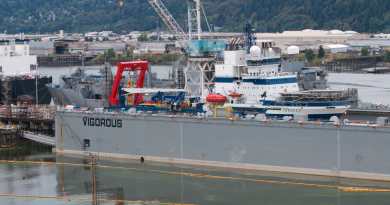 The Fennica, a vessel that Royal Dutch Shell PLC plans to use in its Arctic offshore drilling project, undergoes repairs on Swan Island, Saturday, July 25, 2015, in Portland, Ore. (Sam Caravana/The Oregonian/AP)