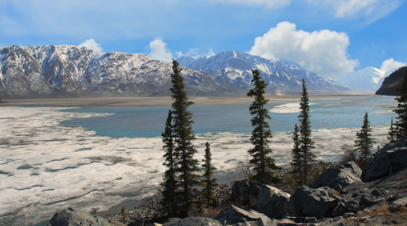 Frozen lake thawing in the Spring in Alaska's Wrangell Mountains. (iStock)