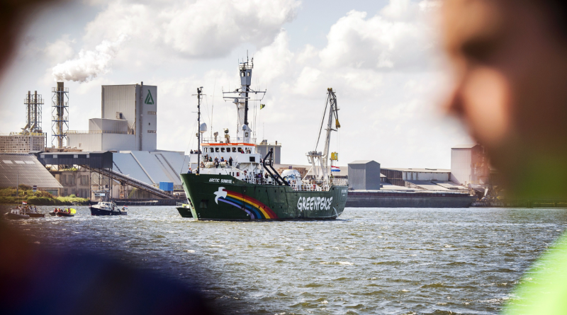 Greenpeace's ice breaker 'Arctic Sunrise' enters its homeport in Amsterdam, The Netherlands, on August 9, 2014, after returning from Murmansk, almost a year after it was seized by Russia during a protest against Arctic oil drilling. (Remko de Waal/AFP/Getty Images)