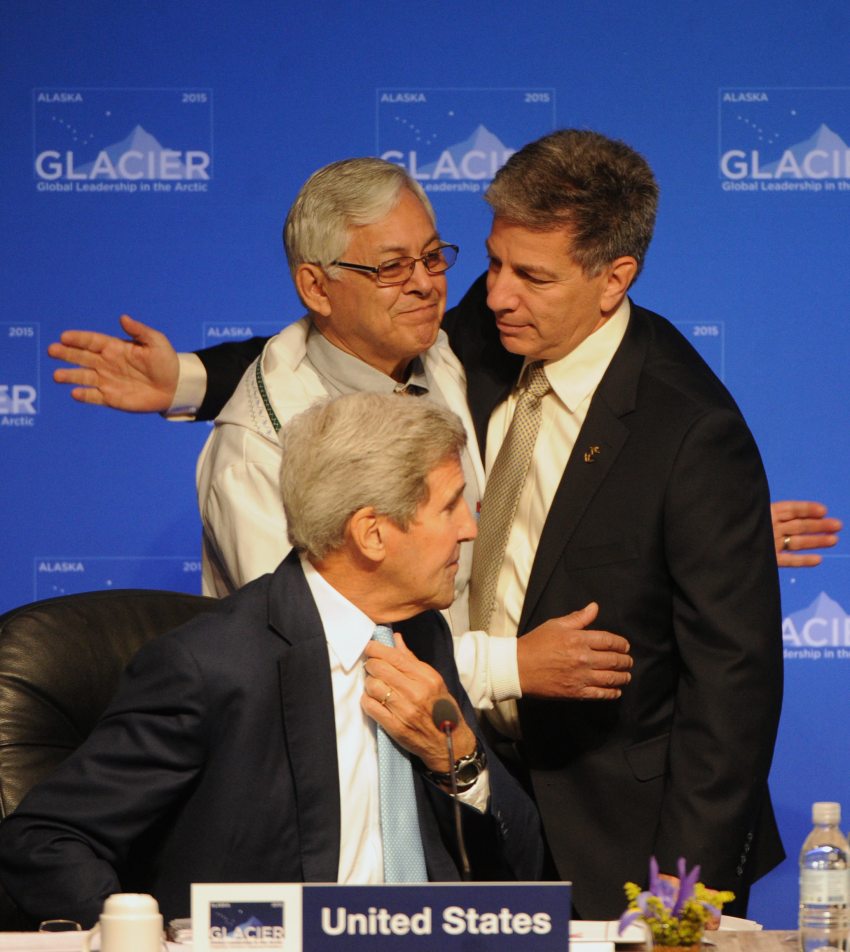 Northwest Arctic Borough Mayor Reggie Joule embraces Anchorage Mayor near Secretary of State John F. Kerry during the Global Leadership in the Arctic: Cooperation, Innovation, Engagement, and Resilience (GLACIER) Conference Opening Plenary at the Dena'ina Center in Anchorage on Monday, Aug. 31, 2015. (Bill Roth / Alaska Dispatch News)