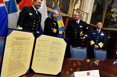 The Joint Statement officially establishing the Arctic Coast Guard Forum is displayed after being signed at the Coast Guard Academy in New London, Conn., Oct. 30, 2015. (Petty Officer 2nd Class Patrick Kelley/U.S. Coast Guard)