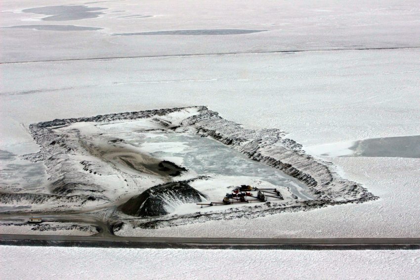 An aerial photo shows a material site with gravel crushing and stockpiling equipment at Mile 403.5 of the Dalton Highway on Saturday, October 10, 2015, near Deadhorse. Crews working for the Department of Transportation and Public Facilities have moved over a million tons of gravel while repairing and upgrading the road after last spring's flooding. (Asaf Shalev / Alaska Dispatch News)