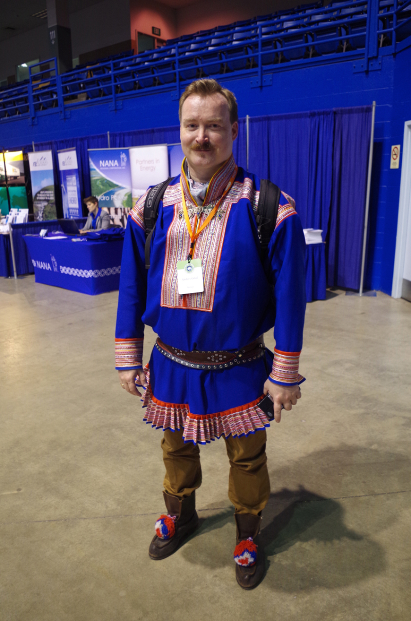 Anders Oskal, Norwegian Sami reindeer herder and Executive Director of the International Centre for Reindeer Husbandry, with his cell phone at the Arctic Energy Summit. (Mia Bennett)
