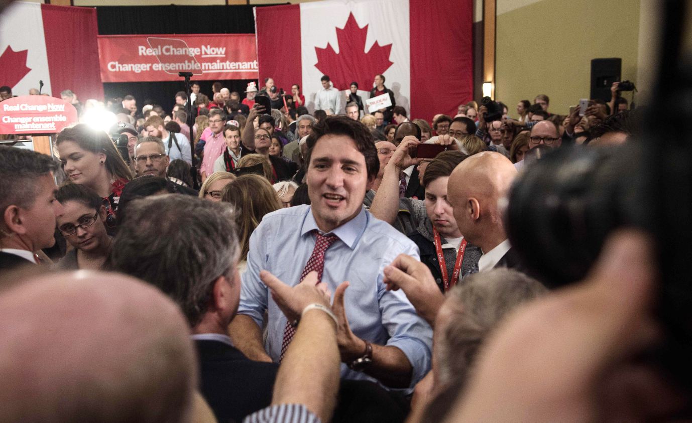Canadian Liberal Party leader Justin Trudeau at a victory rally in Ottawa on October 20, 2015 after winning the general elections.Trudeau reached out to Canada's traditional allies after winning a landslide election mandate to change tack on global warming and return to the multilateralism sometimes shunned by his predecessor Conservative Prime Minister Stephen Harper. (Nicholas Kamm/AFP/Getty Images)