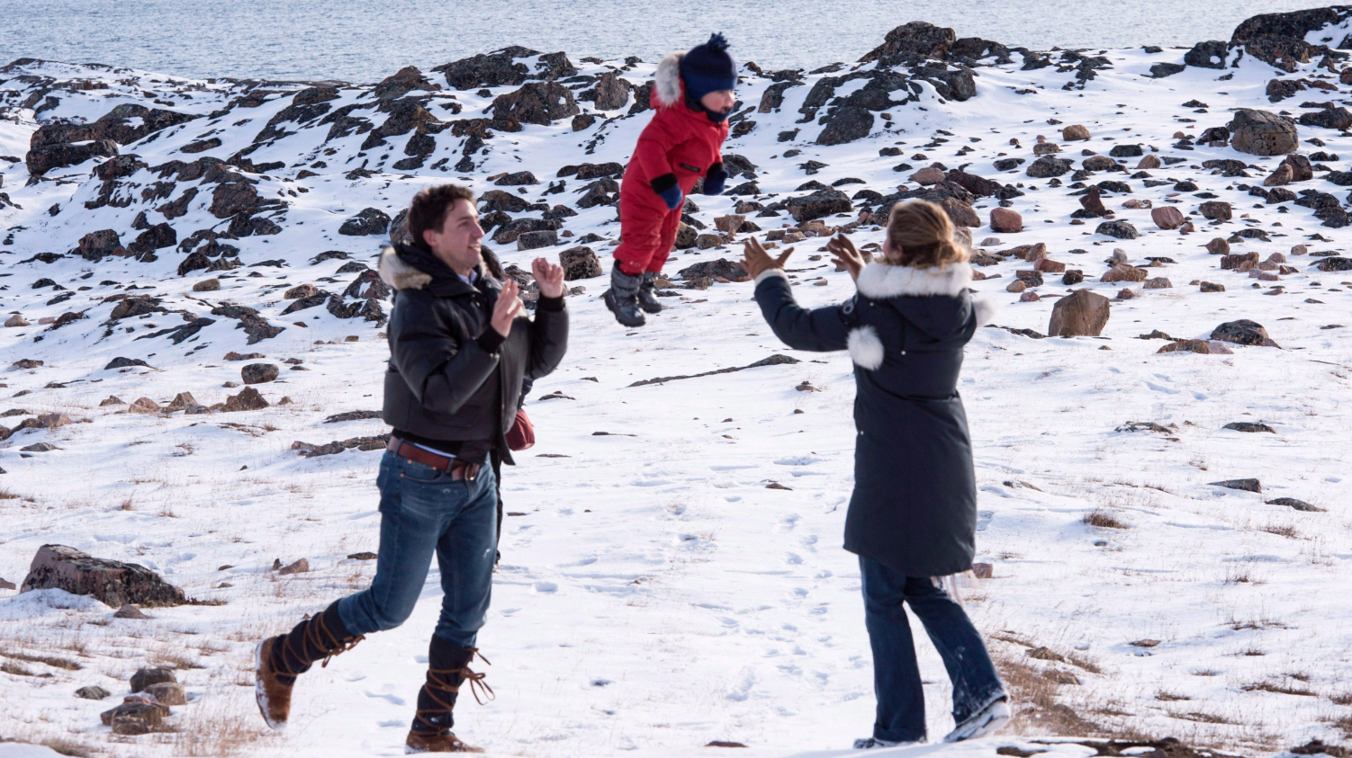 Prime Minister-designate Justin Trudeau and his wife Sophie Gregoire-Trudeau with thier youngest son Hadrien in the Arctic Canadian city of Iqaluit on October 10, 2015. (Paul Chiasson/The Canadian Press)