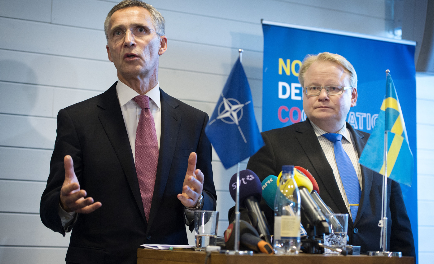 NATO General Secretary Jens Stoltenberg (L) and Sweden’s Defence Minister Peter Hultqvist at a press conference on November 10, 2015. A story looking at Sweden's greater cooperation with NATO were among your most read stories on Eye on the Arctic this week. (Jessica Gow/AFP/Getty Images)