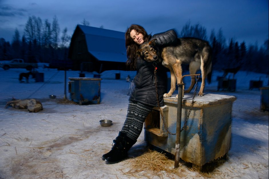 Iditarod veteran Karin Hendrickson, shown here with her dog Whack-A-Mole, plans to race in the 2016 Iditarod. Hendrickson, of Willow, was seriously injured when a vehicle struck her four-wheeler while she was training her dog team in 2014. Marc Lester / ADN