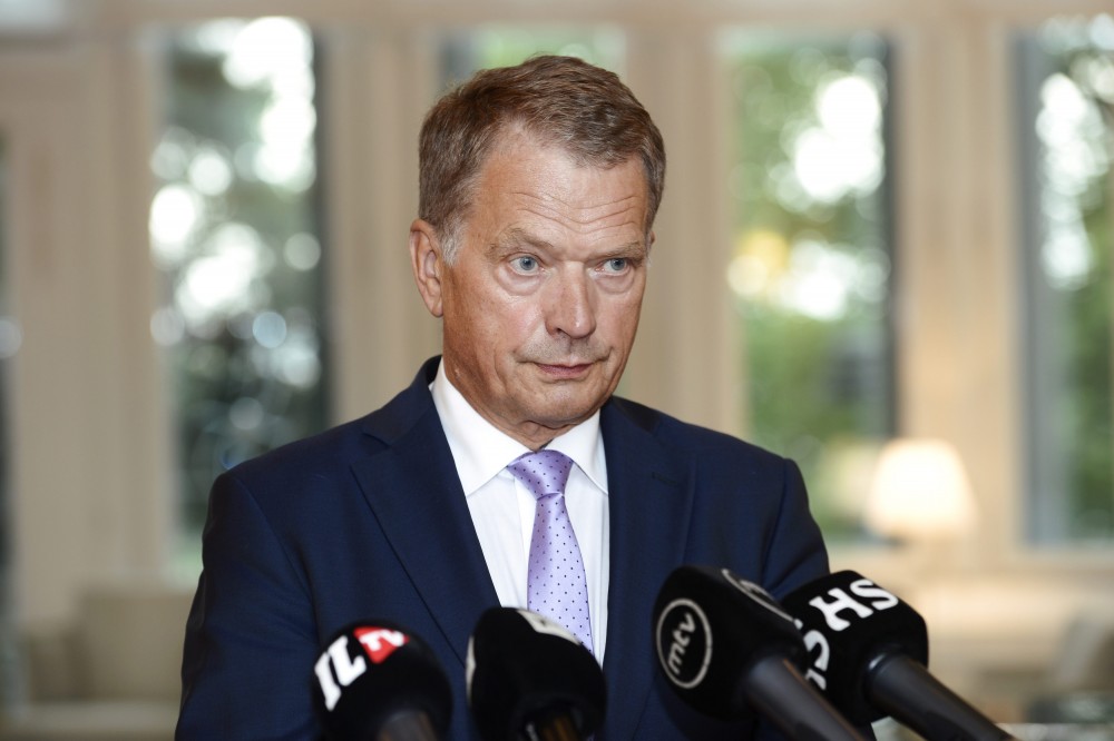 Finland's President Sauli Niinisto speaks to the media in Helsinki August 14, 2014. REUTERS/Heikki Saukkomaa/Lehtikuva