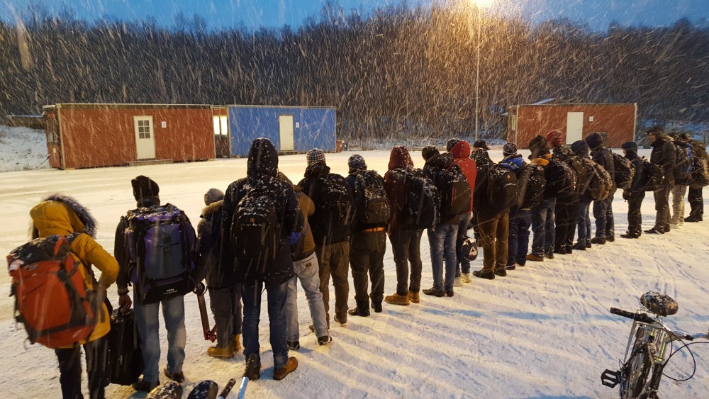 Refugees lined up at Storskog border checkpoint last autumn. Photo: Thomas Nilsen