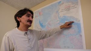 Jerry Natanine, former mayor of Clyde River, points to the area affected by seismic testing. Photo Elyse Skura/CBC