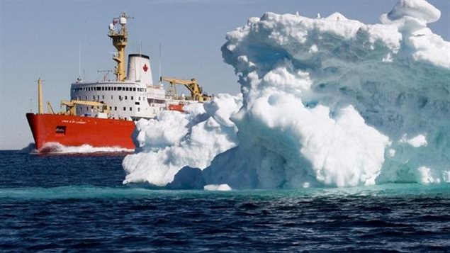 The Canadian Coast Guard icebreaker Louis S. St-Laurent sails past an iceberg in Lancaster Sound, Friday, July 11, 2008. Canada still has little capacity to respond to emergencies in the Arctic while risks increase from more shipping, development pressure, and sovereignty control concerns. ( Jonathan Hayward/ The Canadian Press)