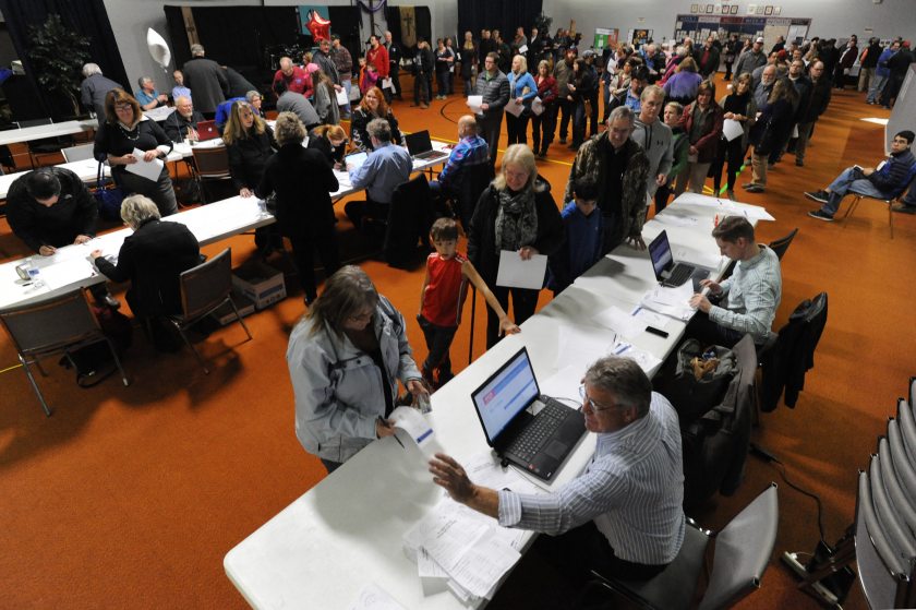 Voters wait in line to get their ballot at the Church of the Nazarene during the Alaska Presidential Preference Poll on Super Tuesday, March 1, 2016. Photo: Bill Roth/ADN