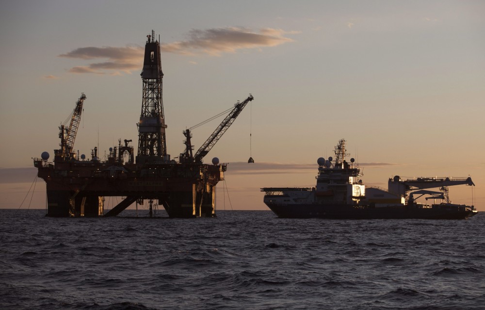 In this photo provided by the Rosneft company, West Alfa drilling platform is seen anchored at the Cara Sea some 250 km (156 miles) north off Russian shore, on Thursday, Sept. 18, 2014. AP Photo/Rosneft press service