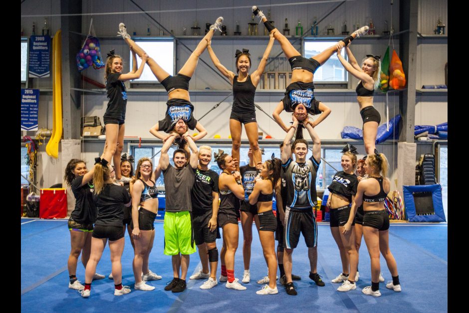 Alaska Athletics cheerleading all stars Black Ice strike a pose April 17, 2016, at Denali Gymnastics & Fitness in Wasilla. The Black Ice team is competing in the 2016 Cheerleading Worlds competition in Orlando, Florida, where their coach says they're favored to do well. Tara Young / ADN