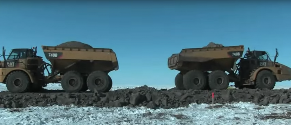 Crews connect the Inuvik to Tuktoyaktuk Highway. Photo: Dez Loreen/Youtube