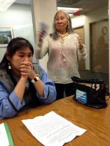 Point Lay tribal council member Cilia Attungowruk, left, and tribal President Marie Tracey met with reporters at the office of the Alaska Wilderness League. ( Liz Ruskin/APRN)