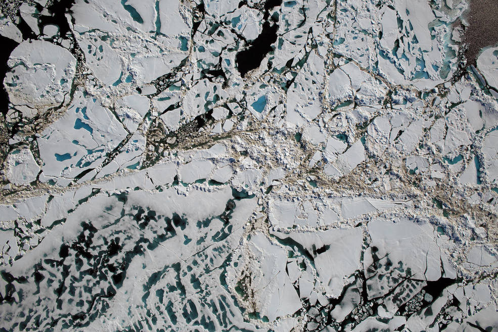 Chunks of sea ice, melt ponds and open water are all seen in this image captured at an altitude of 1,500 feet by the NASA's Digital Mapping System instrument during an Operation IceBridge flight over the Chukchi Sea on Saturday, July 16, 2016. (NASA/Goddard/Operation IceBridge)