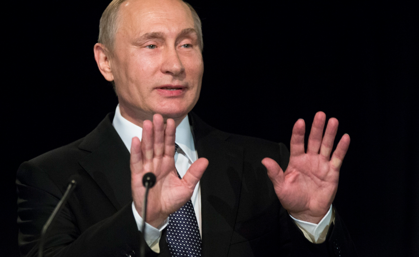 Russian president Vladimir Putin, (pictured above in Russia in June 2016) has expressed contradictory views of Finland's decision-making, according to a researcher. (Alexander Zemlianichenko/AP/The Canadian Press)