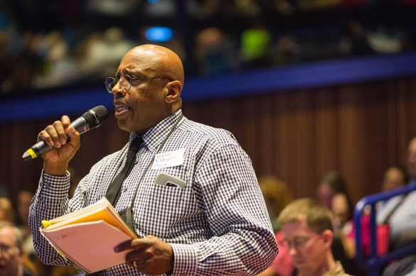 The Rev. Reginald Bright, a veteran who uses opioid pain medication, asks a question of U.S. Surgeon General Vivek Murthy during the Wellness Summit at the Glenn Massay Theater on Thursday. Bright wanted to know why it was so hard to access medical marijuana, and why the Veterans Administration wouldn’t pay for it as treatment for pain. (Loren Holmes / Alaska Dispatch News)