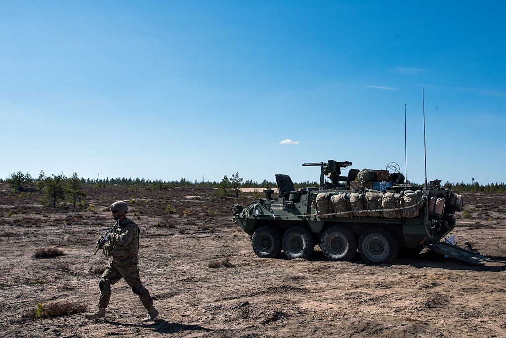 U.S. army soldier and Stryker armored vehicle during "Arrow 16" mechanised exercise of the Finnish Army in collaboration with U.S. Army Europe's 2nd Cavalry Regiment's Mechanized Infantry Company in Niinisalo, Finland, on May 4, 2016. (ELIAS LAHTINEN/AFP/Getty Images)