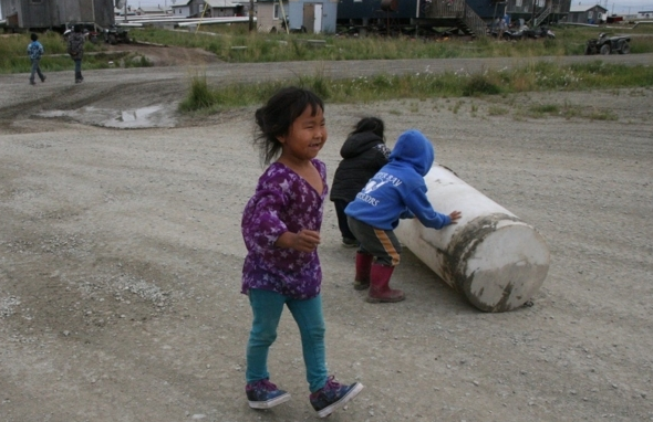 Children in the Southwestern Alaska village of Hooper Bay play on Thursday, Aug. 11, 2016. (Lisa Demer / Alaska Dispatch News)