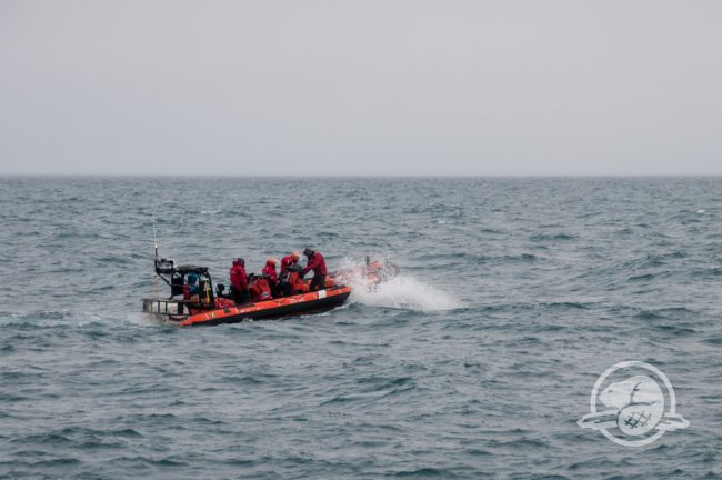 Parks Canada and Canadian Coast Guard personnel make their way towards Terror Bay, Nunavut, to document the wreck with a multi-beam echosounder (Parks Canada)