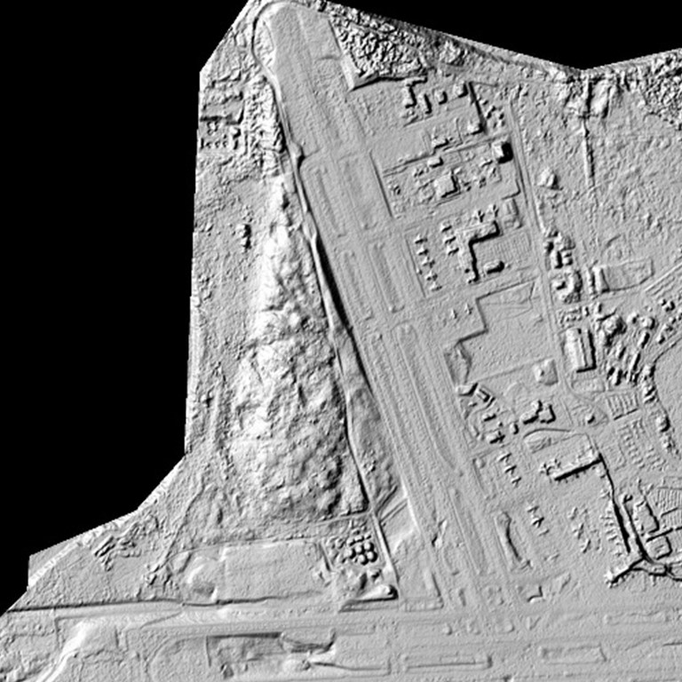 A digital elevation model of Anchorage, Alaska, shows planes parked off the runway of Ted Stevens International Airport. Better elevation maps can be used to quantify changes in sea level and monitor coastal erosion in order to identify buildings and critical infrastructure -- like airports -- at high risk of storm-surge damage, and to identify safe places to shelter when storms come. (NGA) 