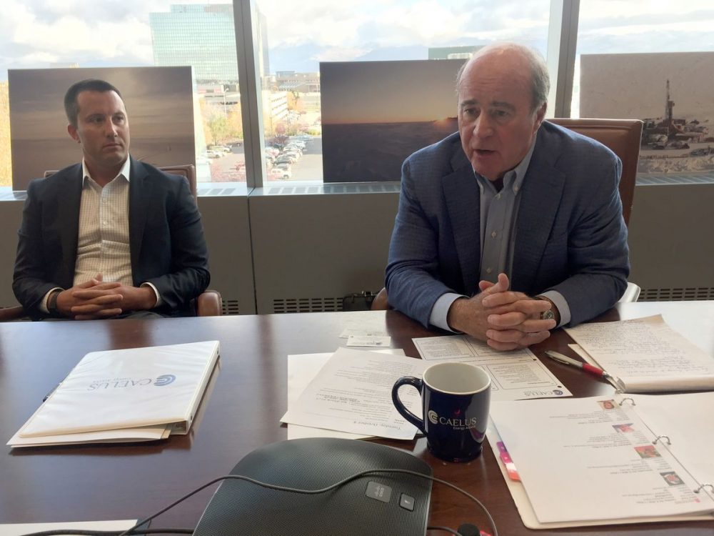 Jim Musselman and his son Matt talk in the Caelus Energy Alaska offices Tuesday, Oct. 4, 2016. Jim is the CEO and Matt is senior vice president. (Alex DeMarban / Alaska Dispatch News)